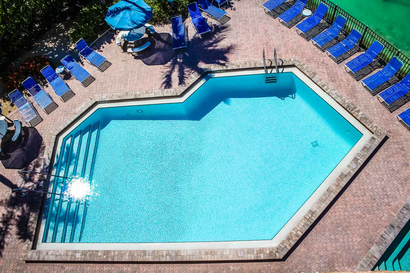 A spacious outdoor swimming pool at VRI's Bonita Resort and Club in Florida.
